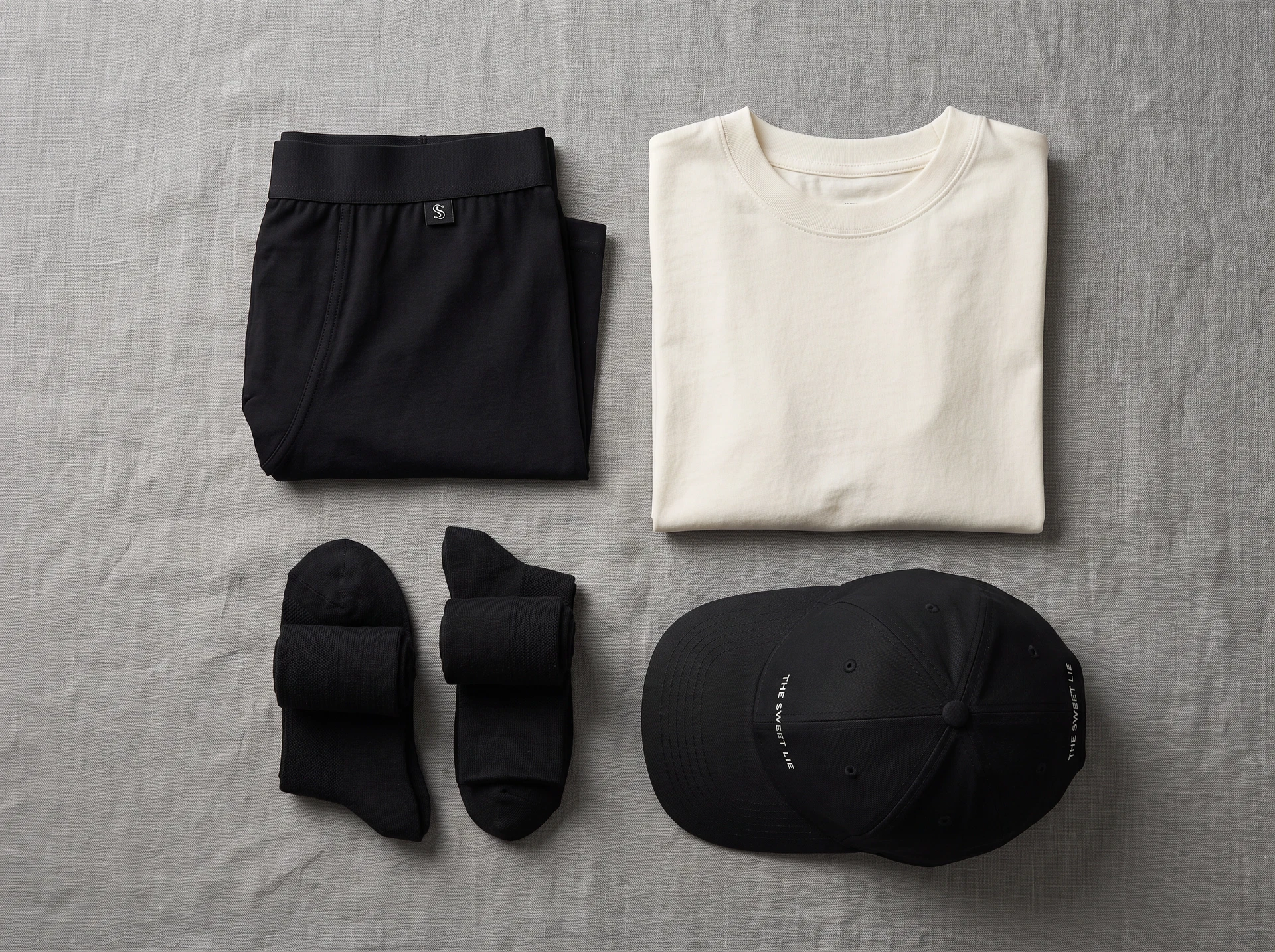 TheSweetLie boxer briefs and everyday essentials flat lay