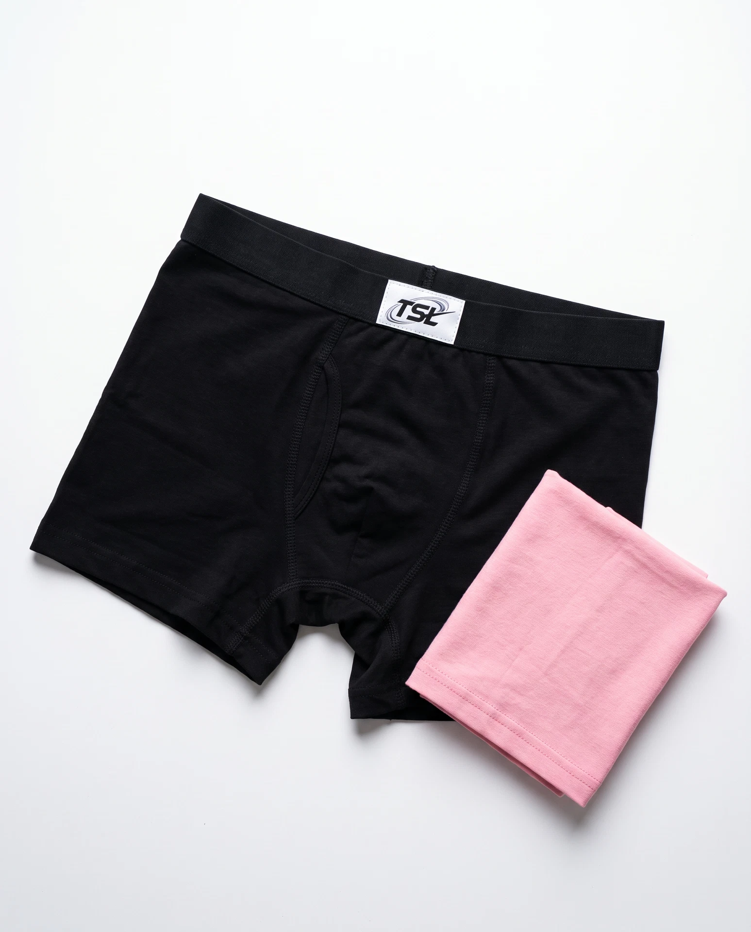 TheSweetLie black boxer briefs with white TSL label
