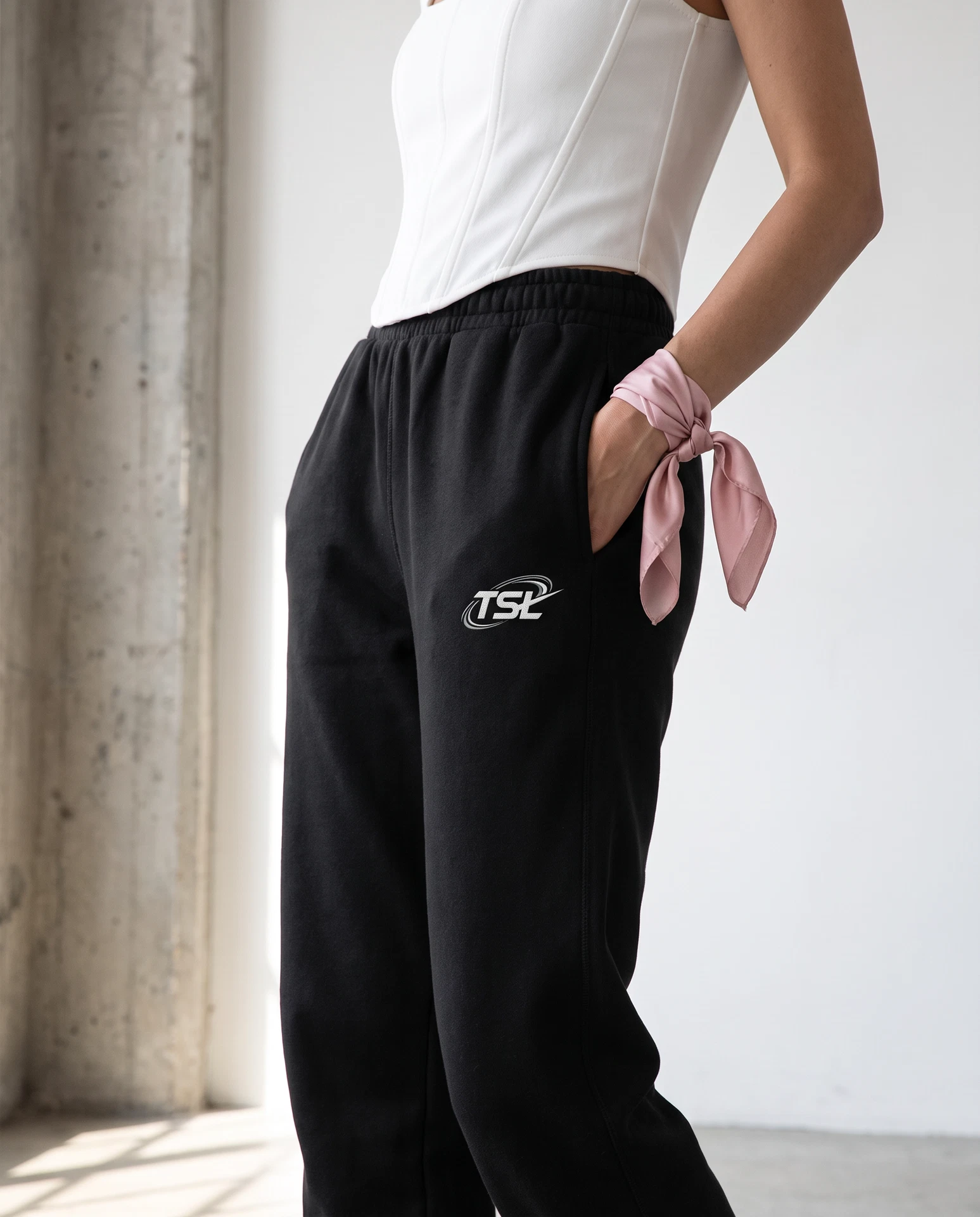 TheSweetLie black joggers with white TSL logo