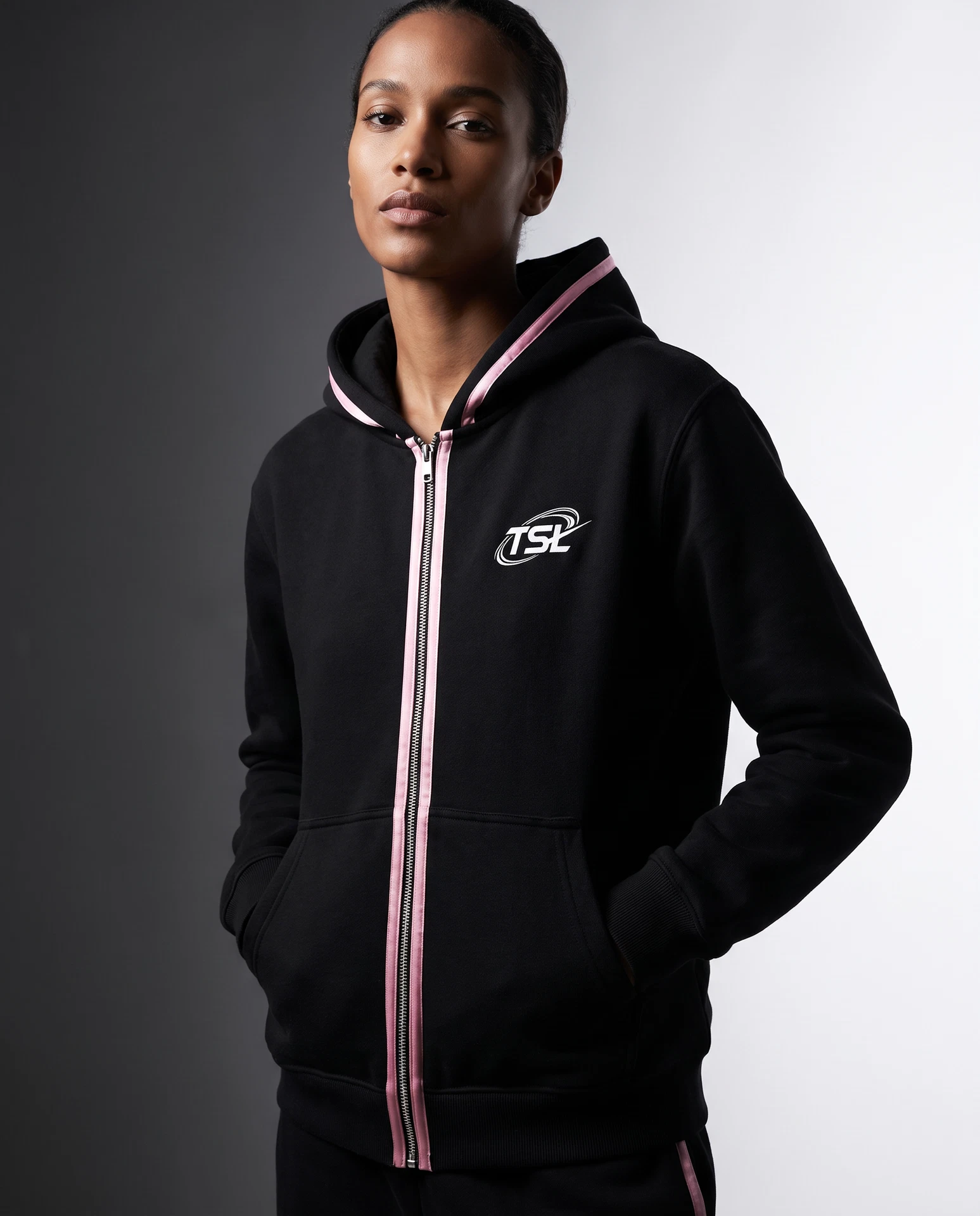 TheSweetLie black zip-up hoodie with white TSL logo