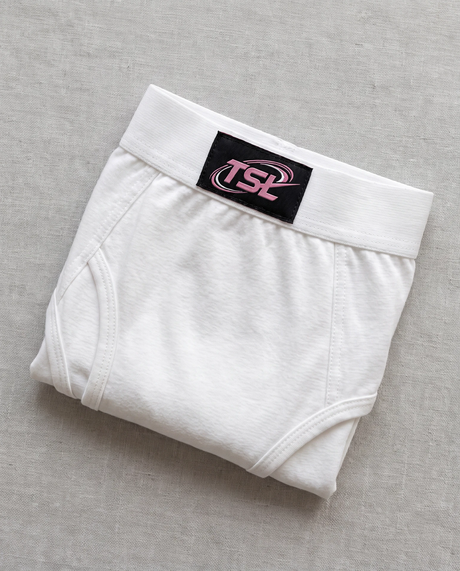 TheSweetLie white panties with black and pink TSL label